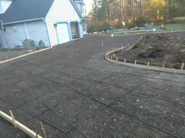 Circular Driveway Around Island: concrete driveway work by Redmond Concrete, concrete contractor serving Woodinville (photo 5 of 7)