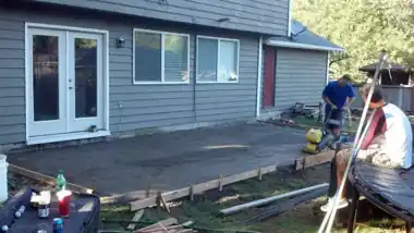 Backyard Patio in Bothell, WA: concrete patio and wall work by Redmond Concrete (photo 2 of 6)