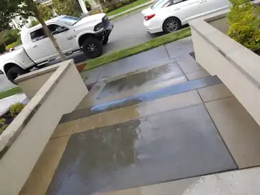 Driveway with Color Bands & Stone Pillars: concrete driveway work by Redmond Concrete, concrete contractor serving Bothell (photo 2 of 2)