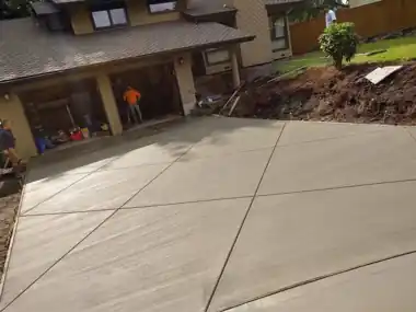 Driveway Pour & Finish: concrete driveway work by Redmond Concrete, concrete contractor serving Bothell (photo 1 of 4)