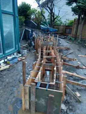 Large Forming Job under Deck: concrete patio and wall work by Redmond Concrete, concrete contractor serving Bothell (photo 3 of 3)