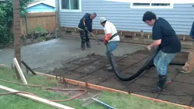 Large Backyard Patio in Bothell, WA: concrete patio and wall work by Redmond Concrete (photo 3 of 6)