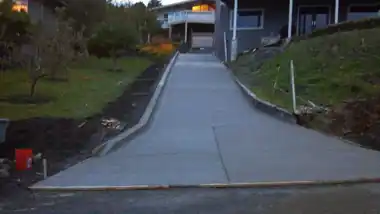 Long Driveway with Curb in Everett, WA: concrete driveway work by Redmond Concrete (photo 1 of 6)