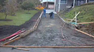 Long Driveway with Curb in Everett, WA: concrete driveway work by Redmond Concrete (photo 2 of 6)