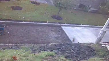 Long Driveway with Curb in Everett, WA: concrete driveway work by Redmond Concrete (photo 3 of 6)