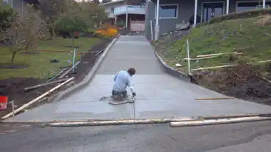 Long Driveway with Curb in Everett, WA: concrete driveway work by Redmond Concrete (photo 6 of 6)