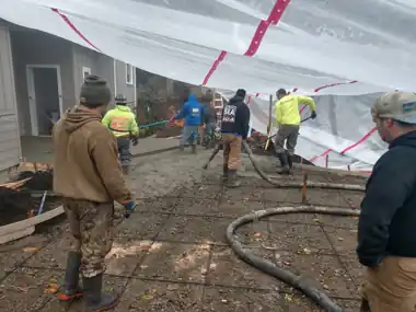 Tented Rainy-Season Driveway Pour: concrete driveway work by Redmond Concrete, concrete contractor serving Kirkland (photo 5 of 5)
