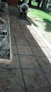 Side Walkway & Utility Pad in Bothell, WA by Redmond Concrete