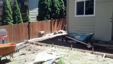 Side Walkway & Utility Pad in Bothell, WA: concrete walkway and steps work by Redmond Concrete (photo 3 of 6)