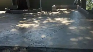 Stamped Concrete Clean & High-Gloss Seal: concrete patio and wall work by Redmond Concrete, concrete contractor serving Redmond (photo 1 of 6)