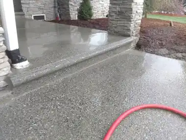 Snohomish Exposed Aggregate Driveway & Custom Architectural Entry in Snohomish, WA: concrete walkway and steps work by Redmond Concrete (photo 3 of 3)
