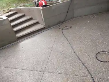 Another Firefighter’s Exposed Aggregate Patio & Round Steps in Bothell, WA: concrete patio and wall work by Redmond Concrete (photo 2 of 9)