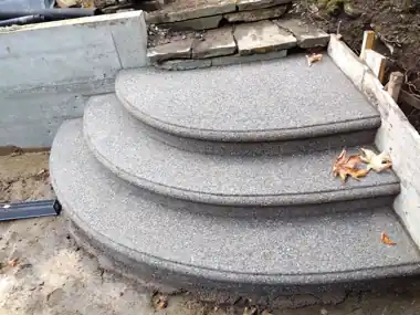 Another Firefighter’s Exposed Aggregate Patio & Round Steps in Bothell, WA: concrete patio and wall work by Redmond Concrete (photo 7 of 9)