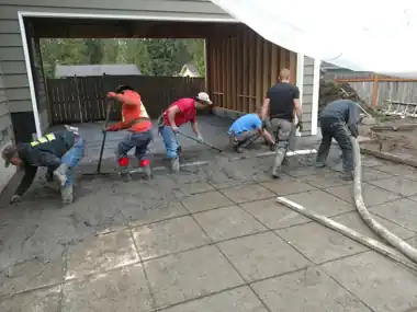 Stamped Patio & Broom-Finish Slab: concrete patio and wall work by Redmond Concrete, concrete contractor serving Kirkland (photo 5 of 5)