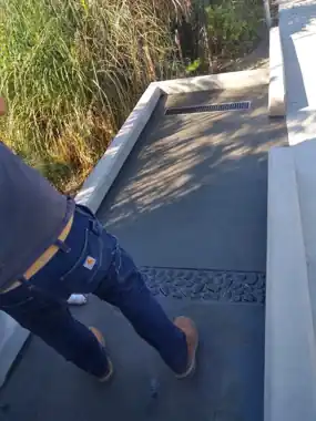 Stamped Walk with Trench Drain: concrete walkway and steps work by Redmond Concrete, concrete contractor serving Woodinville (photo 2 of 2)